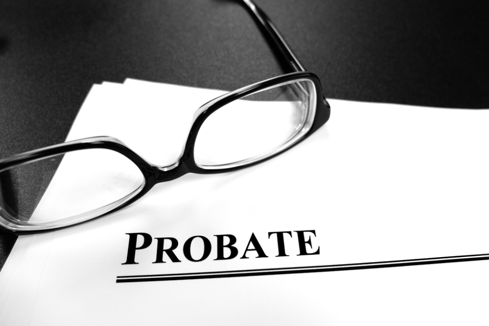 probate last will and testament estate planning documents on desk with glasses