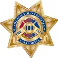 Gold star-shaped badge with "San Pablo California Police" and "The 100 Club" text, featuring a circular emblem.